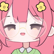 a girl with pink hair wearing glasses and a green shirt
