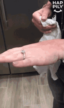 engaged happily ring diamond proposal