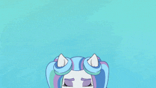 a cartoon pony with blue and purple hair is smiling