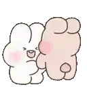 a white rabbit and a pink rabbit are sitting next to each other .