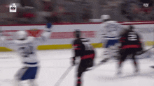a hockey game is being played with a sn logo in the corner