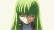 a close up of a person with green hair
