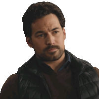 a man with a beard is wearing a vest and says good for you