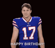 a football player in a blue jersey is giving a thumbs up and saying happy birthday .