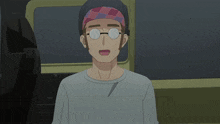 a man wearing glasses and a headband is standing in a car