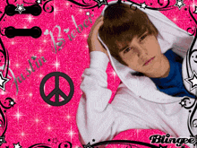 a picture of justin bieber on a pink background with a peace sign