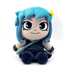 a stuffed toy with blue hair and a yellow flower on her head