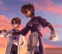a baseball player wearing a purple jersey with the number 12 on it stands next to a doctor