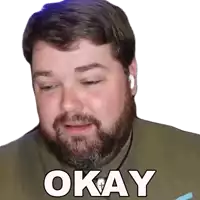 a man with a beard is wearing headphones and has the word okay written on his face