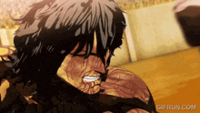 a gif from gifrun.com shows a man getting punched