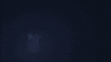 a dark blue background with a few lines of light