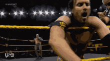 a man in a wrestling ring with usa written on the bottom