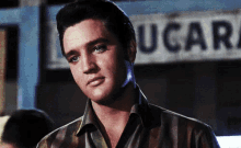 Elvis Smirk GIF - Elvis Presley Smirk Smile GIFs