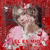 a picture of a girl with blood on her face and the words el es mio above her