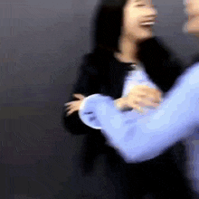 a blurry picture of a man and woman dancing