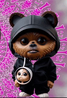 a teddy bear wearing a black hoodie holds a baby in its mouth