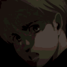 a close up of a cartoon character 's face with a dark background