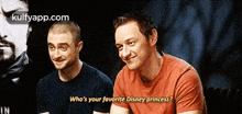 two men are sitting next to each other and one of them is asking the other who 's your favorite disney princess