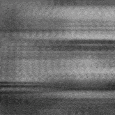 a black and white photo of a blurred image of a person 's face .