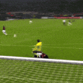 a soccer player kicks a ball in front of a mastercard sign