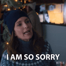 a woman wearing a hat and sweater says " i am so sorry "