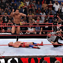 The Rock The Peoples Elbow GIF - The Rock The Peoples Elbow Kurt Angle GIFs
