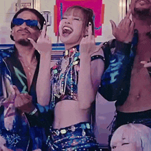a woman in a crop top is giving the middle finger to a man in sunglasses