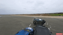 a video shows a car on its side and says thinki jules on the bottom