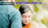 a blurred image of a man and a woman with the website starttamilchat.in visible