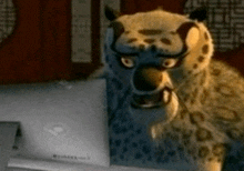 a cartoon leopard is looking at a laptop screen