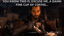 a man is sitting at a table with a cup of coffee and a card in his hand .