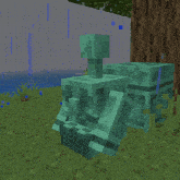 a statue in a minecraft game is sitting in a grassy area