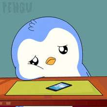 a penguin is sitting at a table with a cell phone in front of it and the word pengu on the bottom