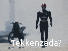 a man in a superhero costume is walking in front of a motorcycle with the words tekkenzada written below him