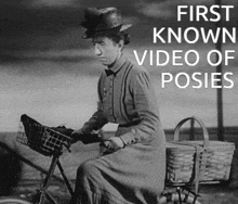 a black and white photo of a woman riding a bike with the words first known video of poses above her