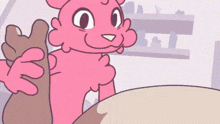 a cartoon of a pink cat holding a piece of bread in its paws .