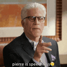 a man wearing glasses and a suit says pierre is speechless .