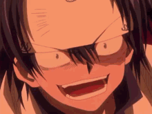 a close up of a person 's face with a very angry look on it .