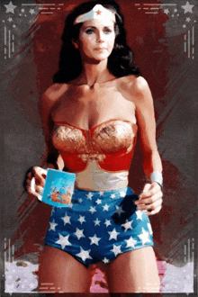 a woman in a wonder woman costume is holding a cup