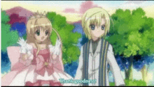 a girl in a pink dress and a boy in a white suit are standing next to each other in a park .