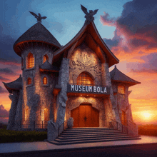 a castle shaped building that says museum bola on the front