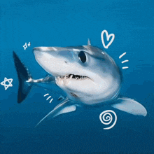 a drawing of a shark in the ocean with hearts and stars around it