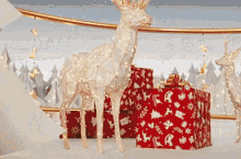a low poly deer standing next to a pile of christmas presents