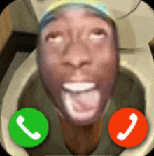 a man is sitting in a toilet with a green and red phone icon