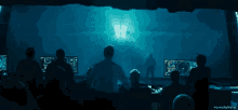 a group of people sitting in front of a screen with the hashtag #godzillamovie at the bottom