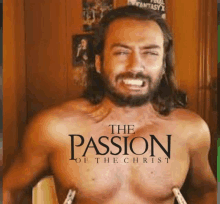 a man with long hair and a beard is shown in a poster for the passion of the christ