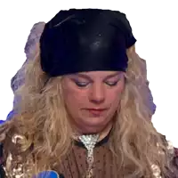 a woman with long blonde hair wearing a black bandana