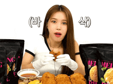 a woman in white gloves is holding a piece of food in front of a bag that says nc