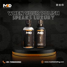 two bottles of mad polish are displayed on a podium
