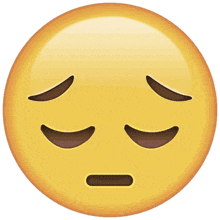 a yellow smiley face with its eyes closed and a black mouth